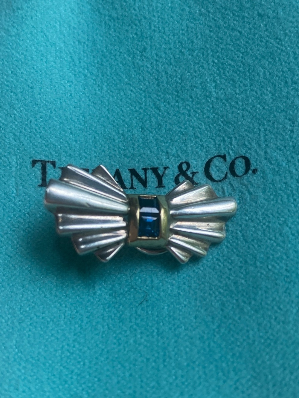 Tiffany & Co. single ribbon clip on bow earring 925 and 14k gold and sapphire